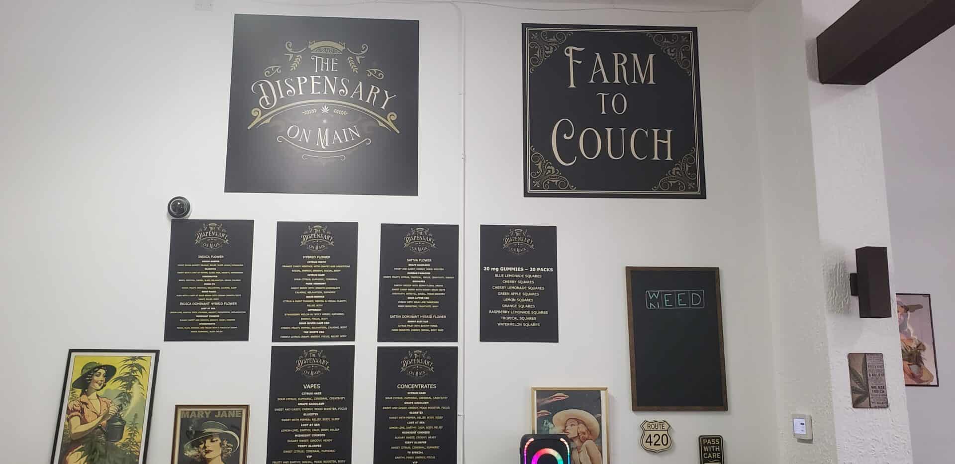 Dispensary interior with product menus and decorations.